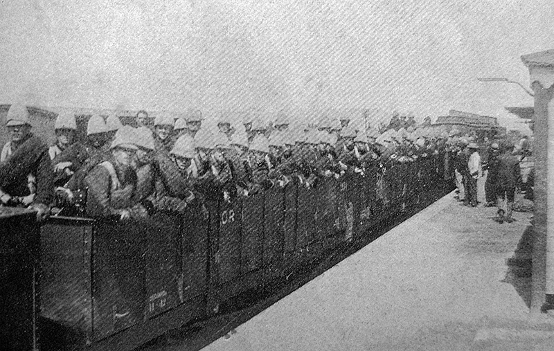 British troops in open rail trucks at De Aar